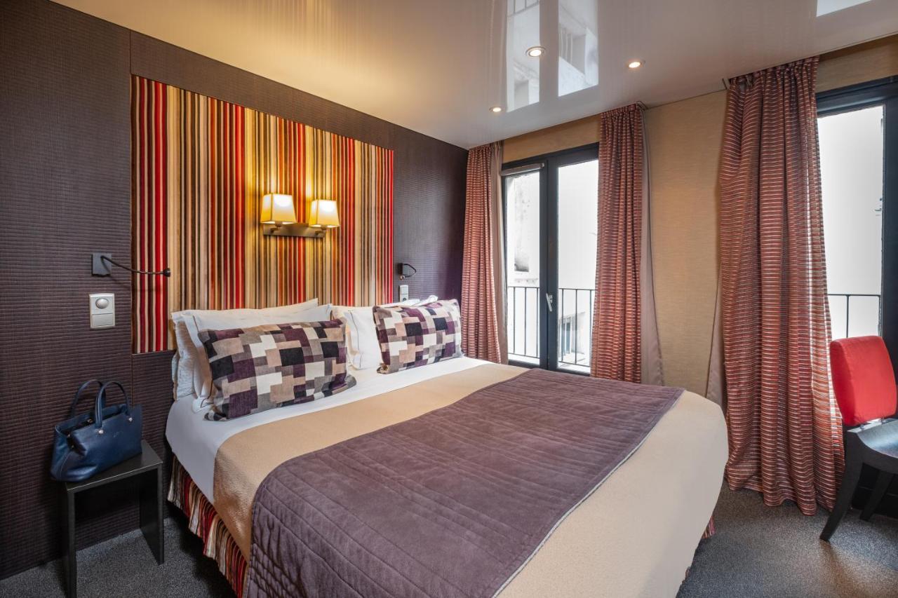 Hotel Du Vieux Saule Paris Bagian luar foto
